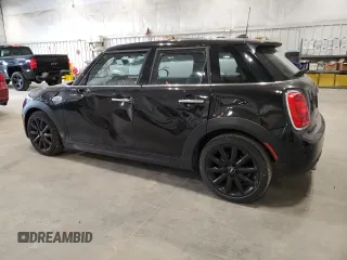 2021 MINI Hardtop 4 Door Oxford Edition with VIN WMWXU7C00M2N49230, listed as a Copart auction lot 77797914 with 51,877 mi miles and Salvage title. Bid and sale history available at DreamBid. Image 2.