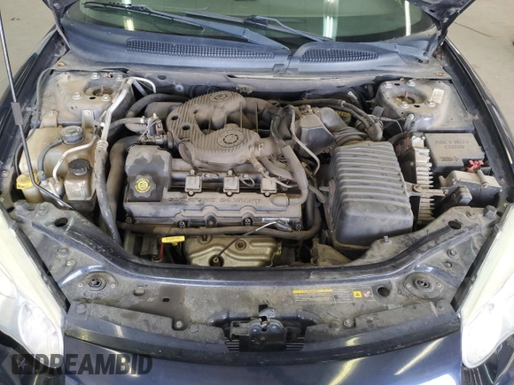 2004 Chrysler Sebring Limited z VIN 1C3EL65R94N151990, wystawiony jako Copart lot #53374215 z przebiegiem 66 257 mil mil oraz Szkoda całkowita • Salvage title. Historia ofert i sprzedaży dostępna na DreamBid. Obrazek 11.