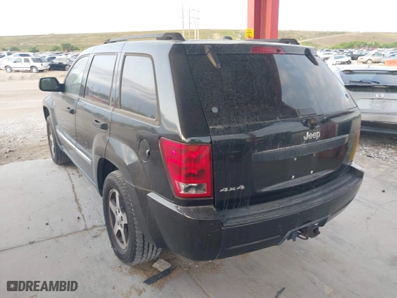 2005 Jeep Grand Cherokee Laredo with VIN 1J4HR48N75C647740, listed as a IAAI auction lot 41803160 with 145,147 mi miles. Bid and sale history available at carsss.com. Image 3.