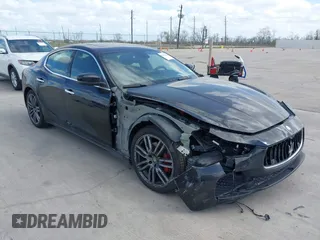2017 Maserati Ghibli with VIN ZAM57XSA6H1218753, listed as a IAAI auction lot 41833235 with 42,135 mi miles. Bid and sale history available at carsss.com. Image 1.