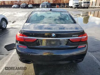 2017 BMW 7 Series 740i with VIN WBA7E2C59HG739788, listed as a Copart auction lot 48073105 with 36,274 mi miles and Salvage Title. Bid and sale history available at carsss.com. Image 6.