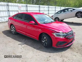 2019 Volkswagen Jetta GLI S z VIN 3VW6T7BU3KM255295, wystawiony jako IAAI lot #42173746 z przebiegiem 63 526 mil mil oraz . Historia ofert i sprzedaży dostępna na DreamBid. Obrazek 1.