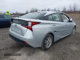 2021 Toyota Prius LE z VIN JTDL9MFU4M3028389, wystawiony jako IAAI lot #41800573 z przebiegiem 32 623 mil mil oraz . Historia ofert i sprzedaży dostępna na DreamBid. Obrazek 4.