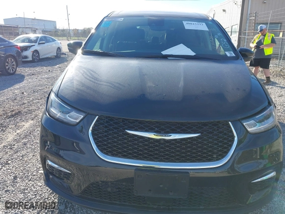 2023 Chrysler Pacifica Hybrid Touring L with VIN 2C4RC1L79PR592477, listed as a IAAI auction lot 40823333 with 8,729 mi miles. Bid and sale history available at carsss.com. Image 12.