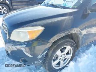 2006 Toyota RAV4 with VIN JTMZD33V065016103, listed as a IAAI auction lot 41619545 with 198,590 mi miles. Bid and sale history available at carsss.com. Image 6.