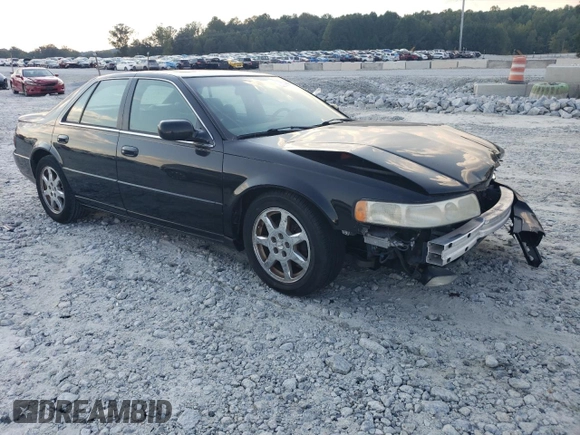2001 Cadillac Seville Touring STS z VIN 1G6KY549X1U282930, wystawiony jako Copart lot #72750504 z przebiegiem Nie podano mil oraz Szkoda całkowita • Salvage title. Historia ofert i sprzedaży dostępna na DreamBid. Obrazek 4.