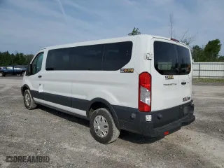 2015 Ford Transit Wagon XL with VIN 1FBZX2YM6FKA97874, listed as a Copart auction lot 57380904 with 81,239 mi miles. Bid and sale history available at carsss.com. Image 2.