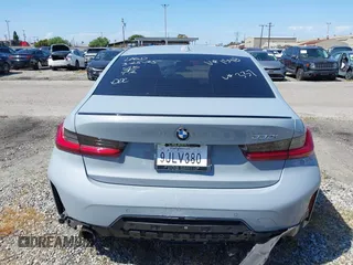2024 BMW 3 Series 330i with VIN 3MW69FF04R8E41348, listed as a IAAI auction lot 42020955 with 23,395 mi miles. Bid and sale history available at carsss.com. Image 16.