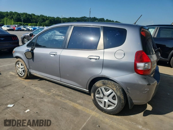 2007 Honda Fit with VIN JHMGD38407S066833, listed as a Copart auction lot 61713125 with 62,917 mi miles and Salvage title. Bid and sale history available at DreamBid. Image 2.