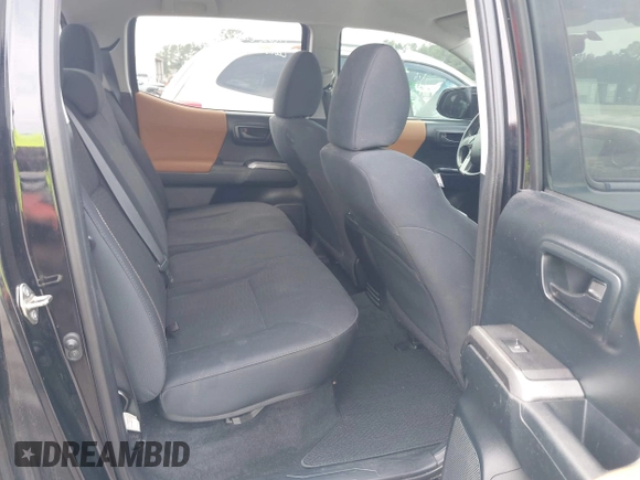 2016 Toyota Tacoma SR5 z VIN 5TFAZ5CN6GX012718, wystawiony jako IAAI lot #42408153 z przebiegiem 136 571 mil mil oraz . Historia ofert i sprzedaży dostępna na DreamBid. Obrazek 8.