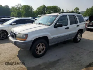 2000 Jeep Grand Cherokee Laredo z VIN 1J4GW48S4YC359267, wystawiony jako Copart lot #60695255 z przebiegiem 123 271 mil mil oraz Czysty tytuł • Clean title. Historia ofert i sprzedaży dostępna na DreamBid. Obrazek 1.