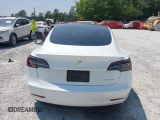 2019 Tesla Model 3 Long Range with VIN 5YJ3E1EB4KF494432, listed as a IAAI auction lot 42009327 with 121,954 mi miles and . Bid and sale history available at DreamBid. Image 16.
