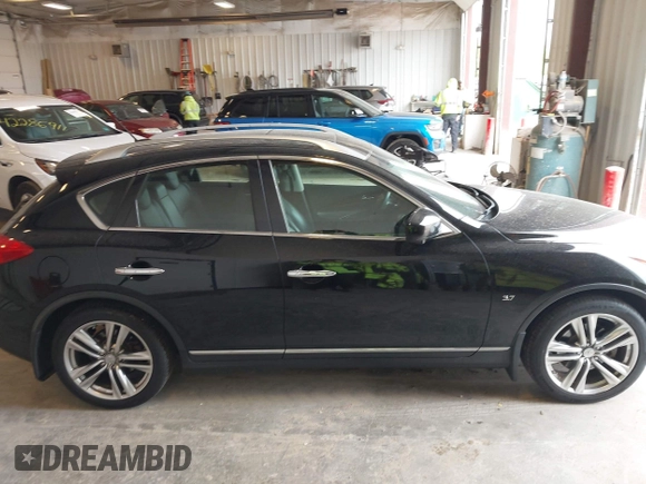 2015 Infiniti QX50 z VIN JN1BJ0HR1FM770088, wystawiony jako IAAI lot #42289675 z przebiegiem 111 563 mil mil oraz . Historia ofert i sprzedaży dostępna na DreamBid. Obrazek 13.