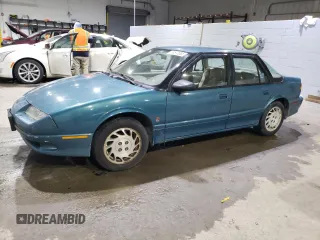 1995 Saturn SL z VIN 1G8ZK5274SZ290163, wystawiony jako Copart lot #63209085 z przebiegiem 47 026 mil mil oraz Nie do naprawy • Non repairable. Historia ofert i sprzedaży dostępna na DreamBid. Obrazek 1.