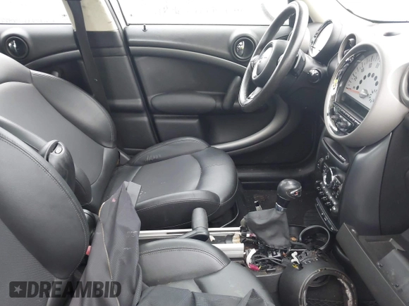 2012 MINI Countryman S with VIN WMWZC5C56CWL56311, listed as a IAAI auction lot 41825109 with Not Provided miles and . Bid and sale history available at DreamBid. Image 5.