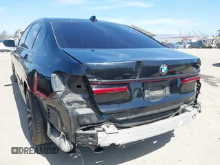 2022 BMW 7 Series 740i with VIN WBA7T2C07NCG88615, listed as a IAAI auction lot 39972481 with 76,169 mi miles. Bid and sale history available at carsss.com. Image 6.