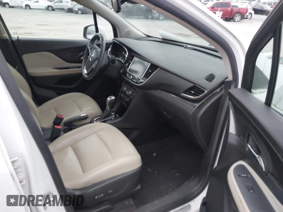 2017 Buick Encore Essence with VIN KL4CJCSB7HB011839, listed as a IAAI auction lot 41303660 with 80,789 mi miles and . Bid and sale history available at carsss.com. Image 5.