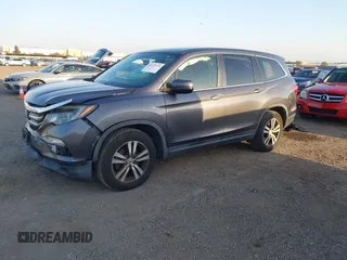 2017 Honda Pilot EX-L with VIN 5FNYF5H74HB010026, listed as a IAAI auction lot 41633770 with 170,383 mi miles and . Bid and sale history available at DreamBid. Image 21.