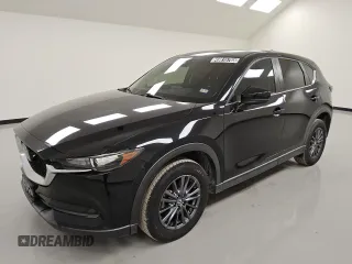 2019 Mazda CX-5 Touring with VIN JM3KFACM0K1682622, listed as a Copart auction lot 49816765 with 98,185 mi miles and Clean Title. Bid and sale history available at carsss.com. Image 1.