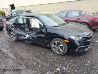 2019 Honda Civic Sedan LX with VIN 2HGFC2F60KH555359, listed as a IAAI auction lot 41626477 with 75,336 mi miles. Bid and sale history available at carsss.com. Image 1.
