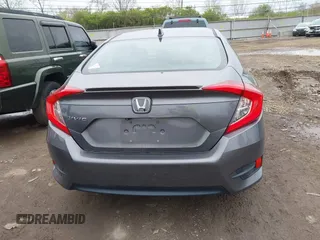2017 Honda Civic EX-T with VIN 19XFC1F34HE014334, listed as a IAAI auction lot 42009311 with 124,717 mi miles. Bid and sale history available at carsss.com. Image 16.