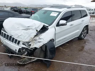 2014 Jeep Grand Cherokee Overland with VIN 1C4RJFCG9EC162098, listed as a IAAI auction lot 41746022 with 120,588 mi miles and . Bid and sale history available at DreamBid. Image 16.