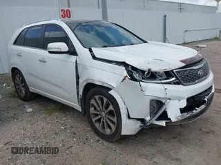 2015 Kia Sorento SX z VIN 5XYKW4A74FG564974, wystawiony jako IAAI lot #42562549 z przebiegiem 126 908 mil mil oraz . Historia ofert i sprzedaży dostępna na DreamBid. Obrazek 1.