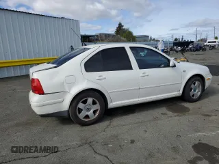 2002 Volkswagen Jetta GL с VIN 3VWRK69M52M024396, выставлен на аукционе Copart как лот 45539355 с пробегом 142 880 миль миль и Списание • Salvage title. История ставок и продаж доступна на DreamBid. Изображение 3.
