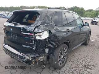 2025 BMW X5 xDrive40i with VIN 5UX23EU08S9Z12797, listed as a IAAI auction lot 42781495 with 7,393 mi miles and . Bid and sale history available at DreamBid. Image 6.