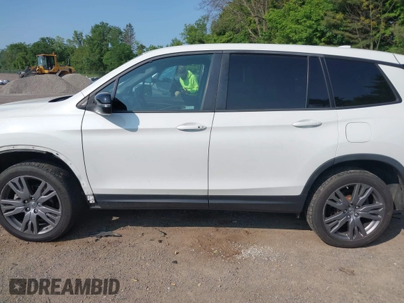 2019 Honda Passport EX-L with VIN 5FNYF8H56KB029748, listed as a IAAI auction lot 42405028 with 59,009 mi miles and . Bid and sale history available at DreamBid. Image 15.