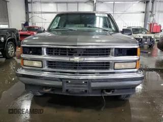 1999 Chevrolet Suburban with VIN 3GNFK16R8XG149091, listed as a Copart auction lot 71300024 with 254,044 mi miles and Salvage Title. Bid and sale history available at carsss.com. Image 5.