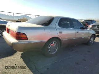 1994 Lexus LS z VIN JT8UF11E1R0205273, wystawiony jako Copart lot #43236585 z przebiegiem 130 052 mil mil oraz Szkoda całkowita • Salvage title. Historia ofert i sprzedaży dostępna na DreamBid. Obrazek 3.