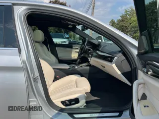 2018 BMW 5 Series 530e with VIN WBAJA9C59JG623166, listed as a Copart auction lot 60938995 with 82,070 mi miles and Clean title. Bid and sale history available at DreamBid. Image 5.