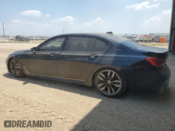 2019 BMW 7 Series M760i xDrive with VIN WBA7H6C50KG615270, listed as a Copart auction lot 59960854 with 42,172 mi miles and Salvage title. Bid and sale history available at DreamBid. Image 2.