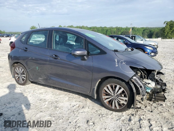 2016 Honda Fit EX-L with VIN 3HGGK5H97GM703726, listed as a Copart auction lot 51288335 with 68,836 mi miles and Salvage title. Bid and sale history available at DreamBid. Image 4.