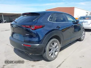 2021 Mazda CX-30 Select with VIN 3MVDMABL5MM272418, listed as a IAAI auction lot 41783355 with 25,429 mi miles and . Bid and sale history available at DreamBid. Image 4.