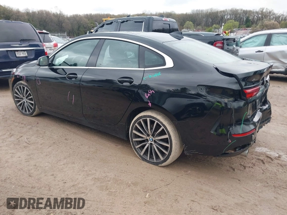 2021 BMW 2 Series 228i xDrive with VIN WBA73AK06M7H58799, listed as a IAAI auction lot 42172057 with 71,412 mi miles and . Bid and sale history available at DreamBid. Image 3.