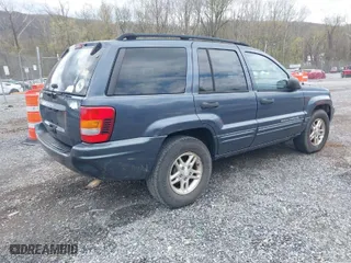 2004 Jeep Grand Cherokee Laredo with VIN 1J4GW48S94C343365, listed as a IAAI auction lot 41917596 with 170,957 mi miles. Bid and sale history available at carsss.com. Image 4.