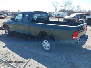 1999 Dodge Dakota SLT z VIN 1B7GL22X0XS128071, wystawiony jako IAAI lot #42010239 z przebiegiem 150 495 mil mil oraz . Historia ofert i sprzedaży dostępna na DreamBid. Obrazek 3.