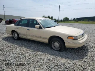 1996 Ford Crown Victoria LX с VIN 2FALP74W1TX192976, выставлен на аукционе Copart как лот 56104895 с пробегом 144 011 миль миль и Списание • Salvage title. История ставок и продаж доступна на DreamBid. Изображение 4.