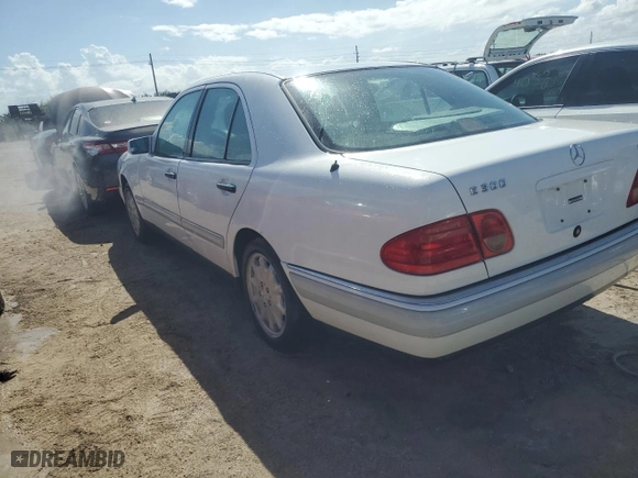 1996 Mercedes-Benz E Class with VIN WDBJF20F1TJ019480, listed as a Copart auction lot 76764114 with 0 mi miles and Salvage Title. Bid and sale history available at carsss.com. Image 2.