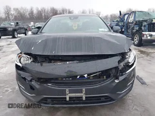 2015 Volvo S60 T5 Premier z VIN YV1612TK3F1359338, wystawiony jako IAAI lot #41645209 z przebiegiem 106 822 mil mil oraz . Historia ofert i sprzedaży dostępna na DreamBid. Obrazek 12.