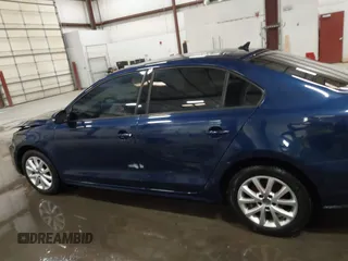 2011 Volkswagen Jetta SE z VIN 3VWDZ7AJ6BM105985, wystawiony jako IAAI lot #41818129 z przebiegiem 126 051 mil mil oraz . Historia ofert i sprzedaży dostępna na DreamBid. Obrazek 14.