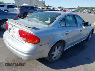 2004 Oldsmobile Alero GL1 z VIN 1G3NL52E54C196878, wystawiony jako IAAI lot #42357662 z przebiegiem Nie podano mil oraz . Historia ofert i sprzedaży dostępna na DreamBid. Obrazek 4.