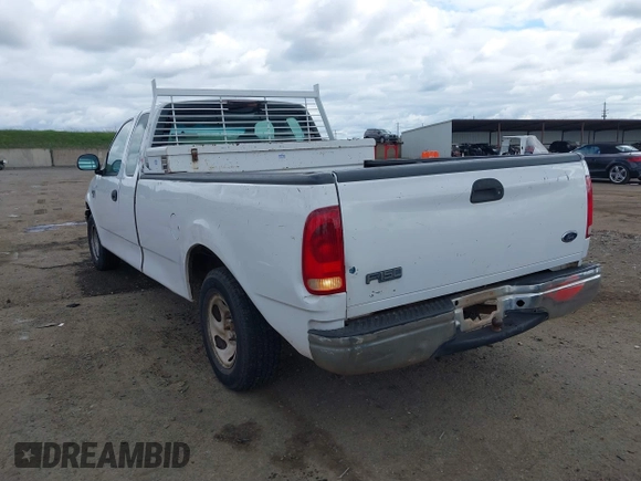 2000 Ford F-150 XL with VIN 1FTRX17W5YKB03384, listed as a IAAI auction lot 41723526 with 281,658 mi miles. Bid and sale history available at carsss.com. Image 3.