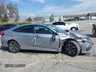 2016 Honda Civic Sedan EX with VIN 2HGFC2F74GH563268, listed as a IAAI auction lot 41805038 with 125,577 mi miles. Bid and sale history available at carsss.com. Image 13.