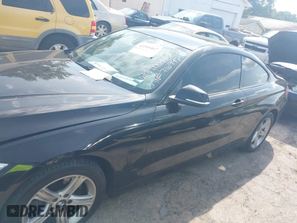 2014 BMW 4 Series 428i xDrive with VIN WBA3N5C52EF716998, listed as a IAAI auction lot 42548467 with 212,418 mi miles and . Bid and sale history available at DreamBid. Image 14.