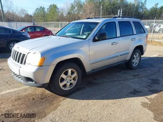 2010 Jeep Grand Cherokee Laredo with VIN 1J4PS4GK5AC156150, listed as a IAAI auction lot 41585346 with 178,237 mi miles. Bid and sale history available at carsss.com. Image 2.