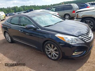 2012 Hyundai Azera with VIN KMHFH4JG2CA174846, listed as a IAAI auction lot 42477082 with 73,371 mi miles and . Bid and sale history available at DreamBid. Image 1.