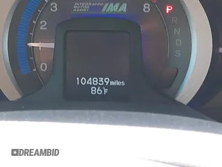 2010 Honda Insight EX with VIN JHMZE2H73AS009253, listed as a IAAI auction lot 41882569 with 104,839 mi miles and . Bid and sale history available at DreamBid. Image 16.